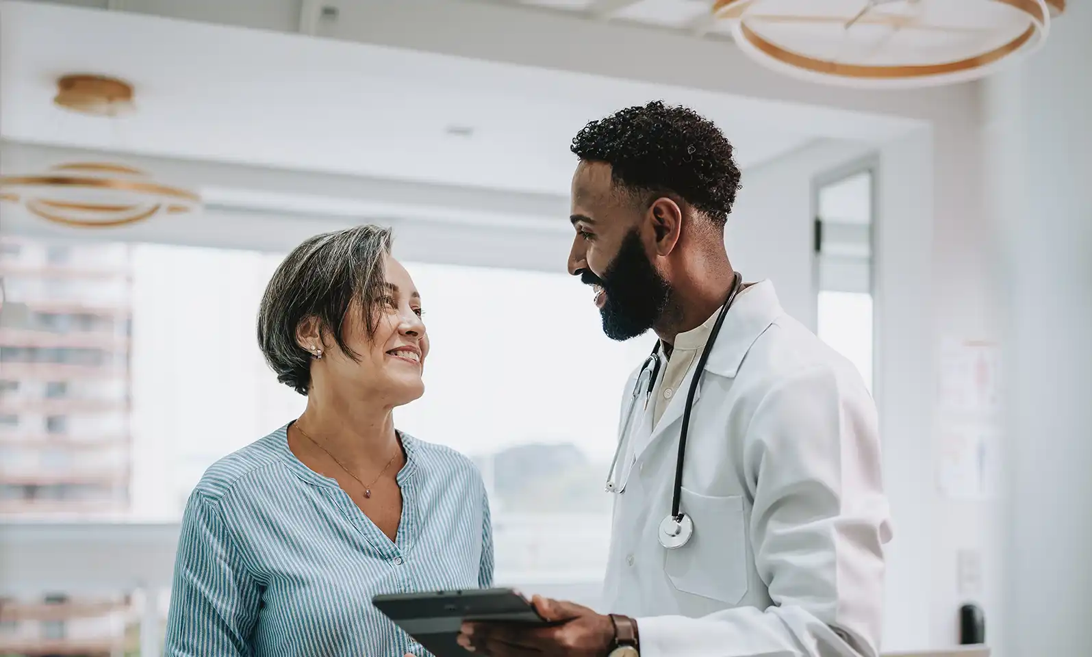 Patient talking with her doctor