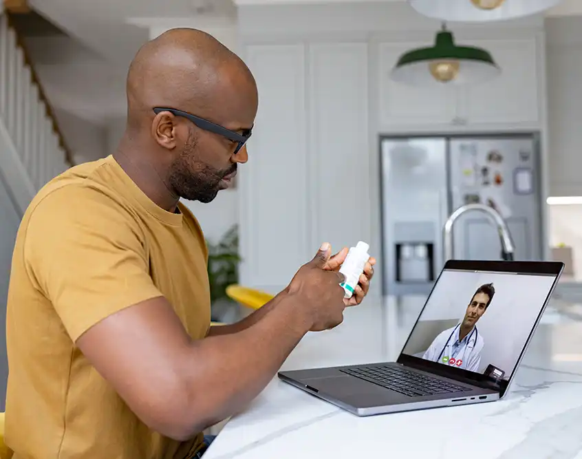 Couple reviewing bills at home