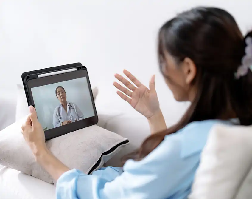 Person on a virtual dermatology visit from home