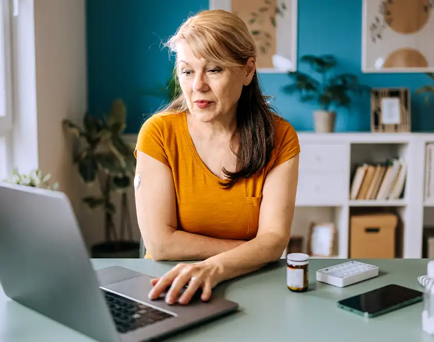 Couple reviewing bills at home