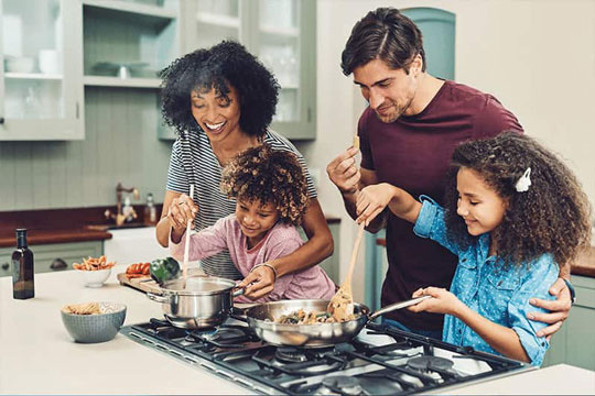 family preparing meal