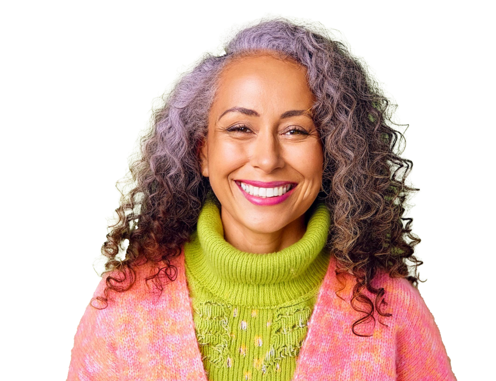 A 65-year-old woman wearing a green sweater and smiling.