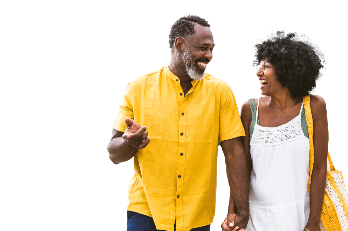  65+ couple in white and yellow outfit smiling with shopping bags